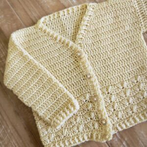 Chaqueta Trigo para bebé a crochet con Merino Land